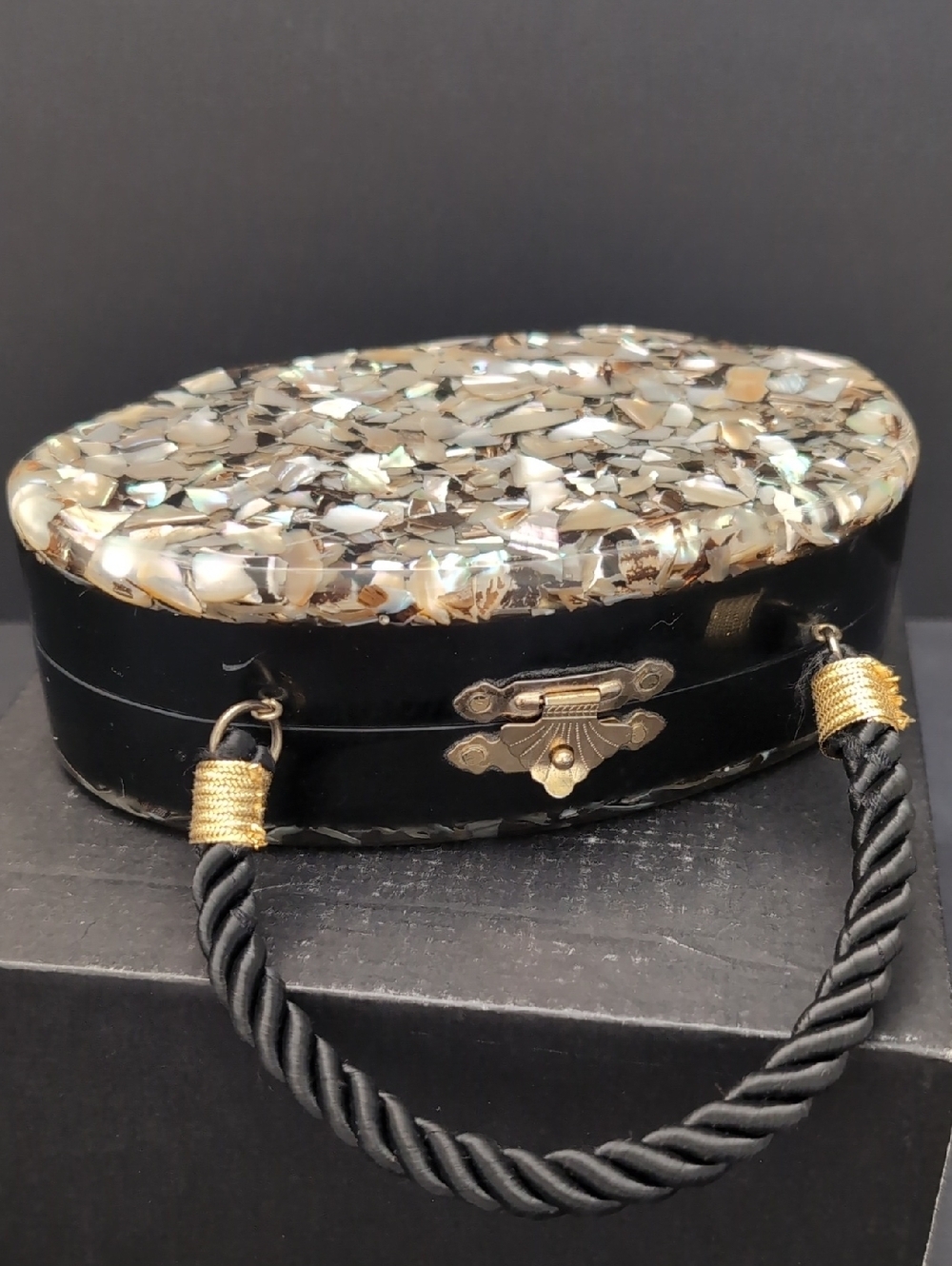 VGT,Art Deco Oval Confetti Clutch with A Bakelite Case And A Rope Handle.